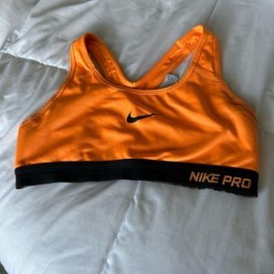 Neon orange nike sports bra